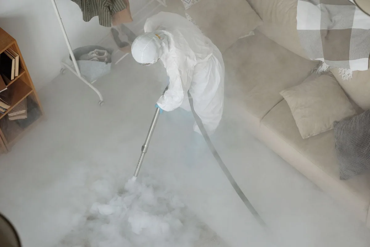 Biohazard cleanup technician in protective equipment, Coosada, AL